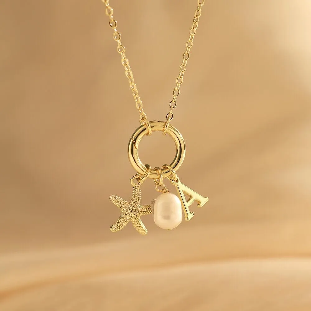 Gold Charm Necklace for Women 14K Gold Plated Initial Necklace Dainty Letter Pearl Starfish Pendant Necklaces for Women Trendy Gold Summer Beach Jewelry